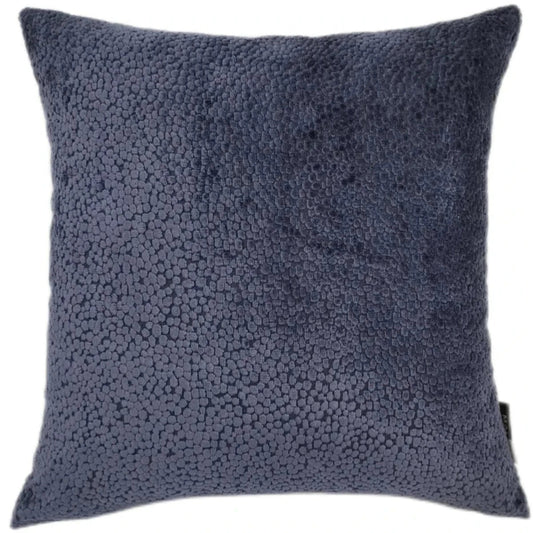 Textured blue pillow on a white background