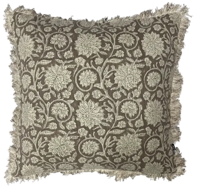 Decorative pillow with floral pattern on a plain background