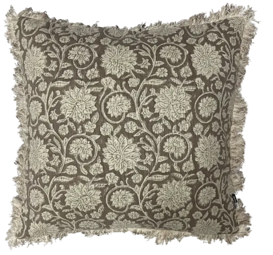 Decorative pillow with floral pattern on a plain background